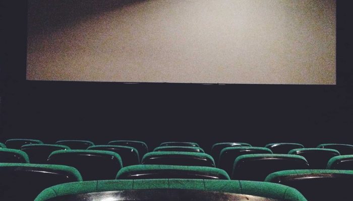 View of the seats and the cinema screen. Empty cinema hall.