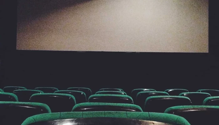 View of the seats and the cinema screen. Empty cinema hall.